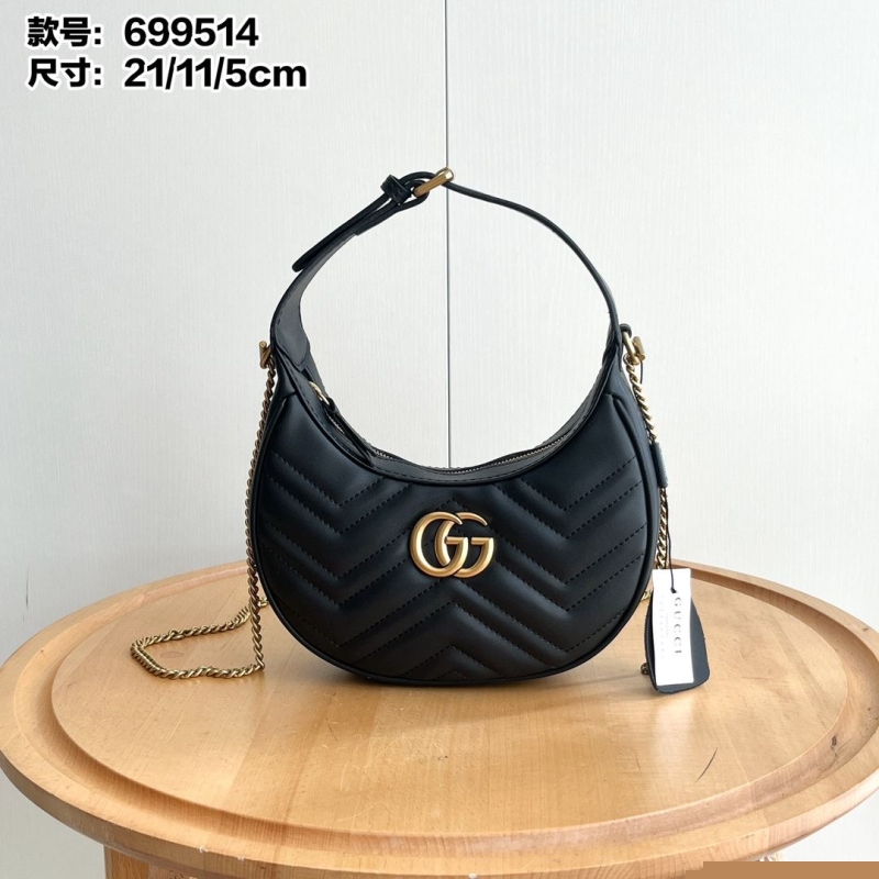 G*u*i top handle bags